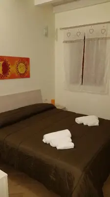Letto o letti in una camera di Al Blu Ortigia Apartments