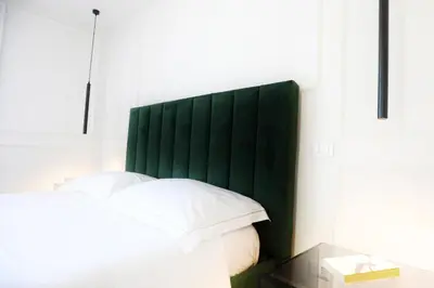 Letto o letti in una camera di Teatro Suites Rooms
