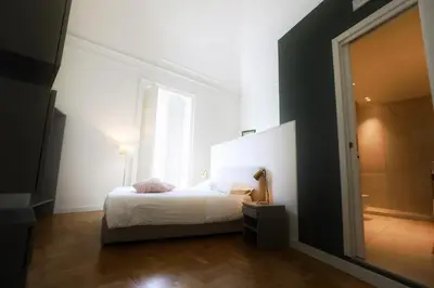 Letto o letti in una camera di Teatro Suites Rooms