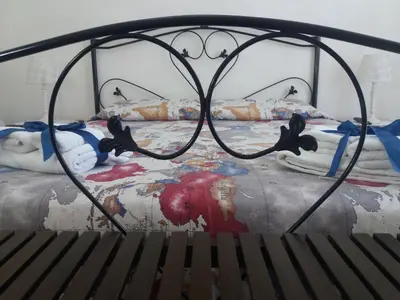 Letto o letti in una camera di Le lumie