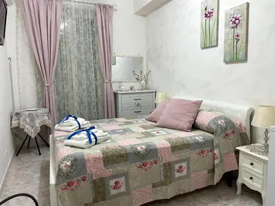 Letto o letti in una camera di Le lumie