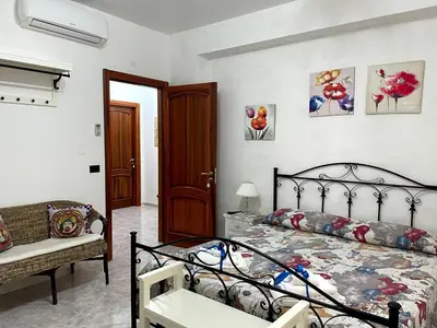 Letto o letti in una camera di Le lumie