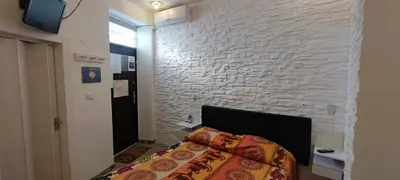 Letto o letti in una camera di Monolocale Ambra
