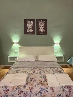 Letto o letti in una camera di Il Cortiletto di Ortigia