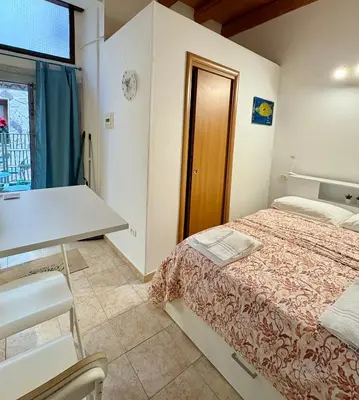 Letto o letti in una camera di Il Cortiletto di Ortigia