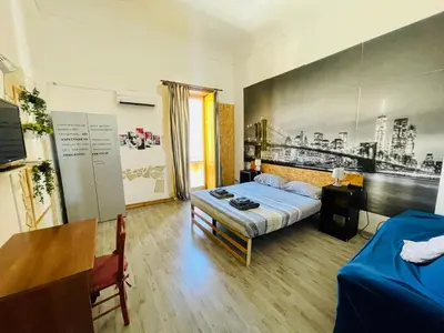 Letto o letti in una camera di Casa Sikania