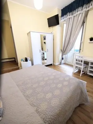 Letto o letti in una camera di Al Quadrato D'Oro rooms