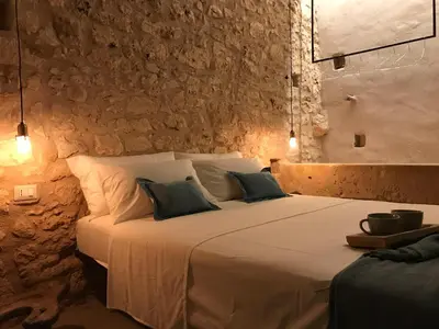 Letto o letti in una camera di Casa Farfaglia