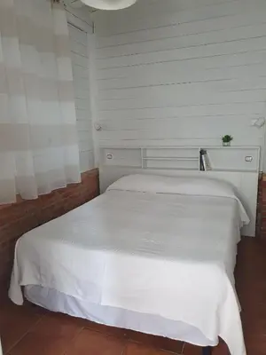 Letto o letti in una camera di Casa Costanza
