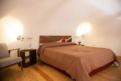 Letto o letti in una camera di Naturalmente abitare