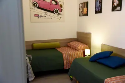 Letto o letti in una camera di Casa Mia