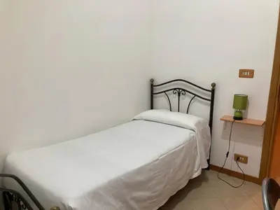 Letto o letti in una camera di B&B La Terrazza Dell'Itria