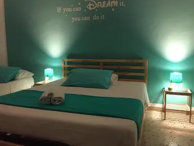 Letto o letti in una camera di I Colori degli Agrumi Holiday Home