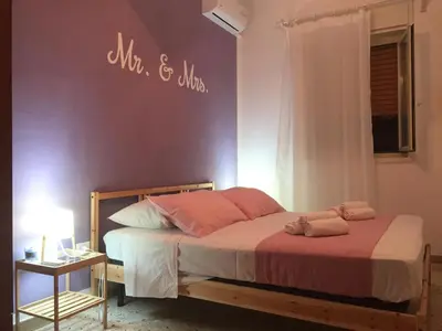 Letto o letti in una camera di I Colori degli Agrumi Holiday Home