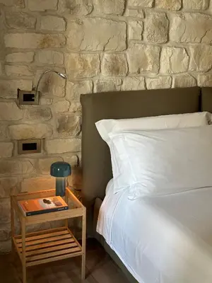 Letto o letti in una camera di Olivia Rooms Eurialo