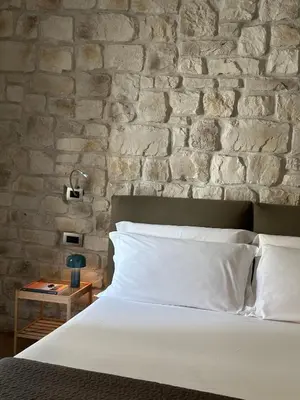 Letto o letti in una camera di Olivia Rooms Eurialo