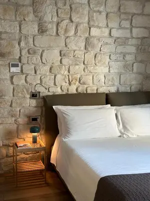 Letto o letti in una camera di Olivia Rooms Eurialo