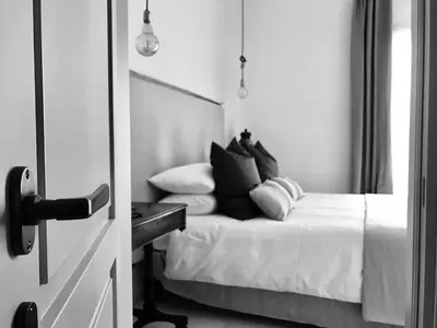 Letto o letti in una camera di Battimandorlo