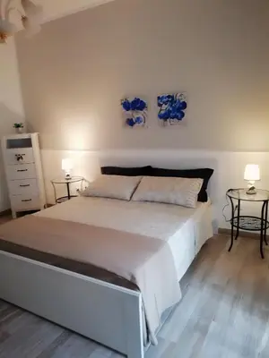 Letto o letti in una camera di Casa Simo