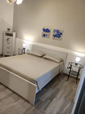 Letto o letti in una camera di Casa Simo