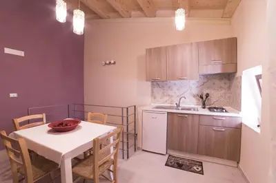 Cucina o angolo cottura di Aura Ortigia Apartments
