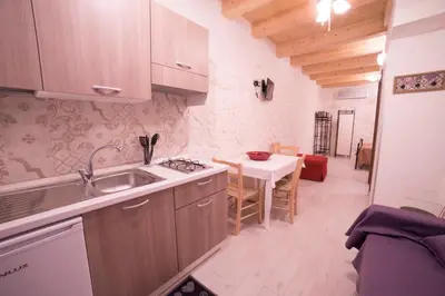 Cucina o angolo cottura di Aura Ortigia Apartments