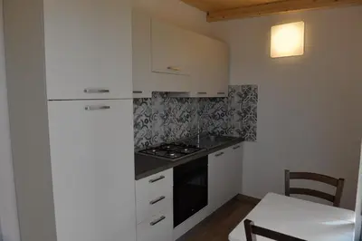 Cucina o angolo cottura di Residence Del Tellaro