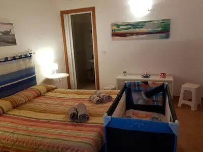 Letto o letti in una camera di Appartamento Aretusa