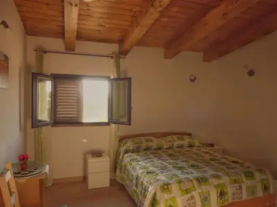 Letto o letti in una camera di Gelsomino B&B