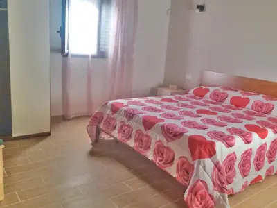 Letto o letti in una camera di Gelsomino B&B