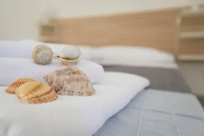 Letto o letti in una camera di Jardinu