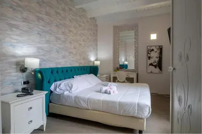 Letto o letti in una camera di Porta Nazionale Dependance
