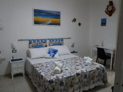 Letto o letti in una camera di La Trinacria di Capo Passero