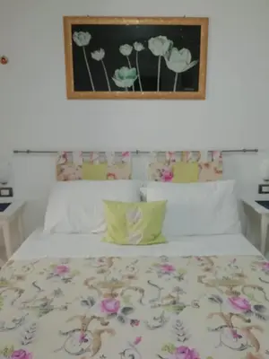 Letto o letti in una camera di La Trinacria di Capo Passero