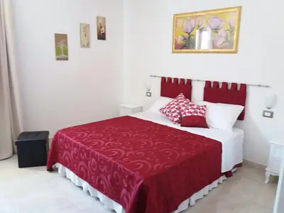 Letto o letti in una camera di La Trinacria di Capo Passero