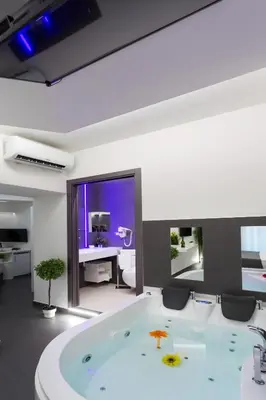 TV o dispositivi per l'intrattenimento presso Le Suites Del Duomo