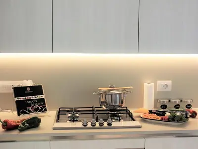 Cucina o angolo cottura di Suite 18, casa di charme in Ortigia