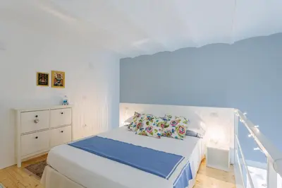 Letto o letti in una camera di Suite 18, casa di charme in Ortigia