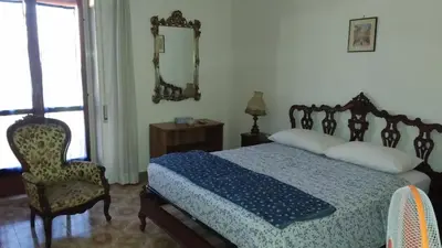Letto o letti in una camera di B&B Cavour