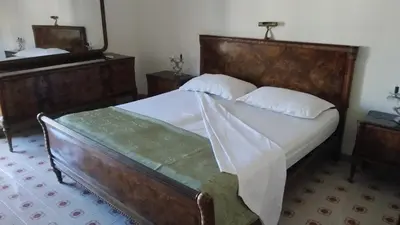 Letto o letti in una camera di B&B Cavour
