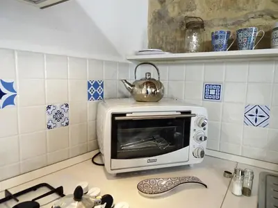 Cucina o angolo cottura di L'arco delle Commari