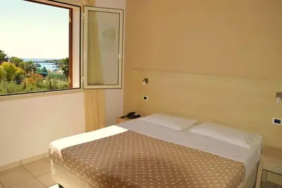 Letto o letti in una camera di Hotel Bulla Regia