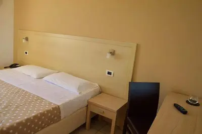 Letto o letti in una camera di Hotel Bulla Regia