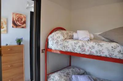 Letto o letti in una camera di Casa Lucia