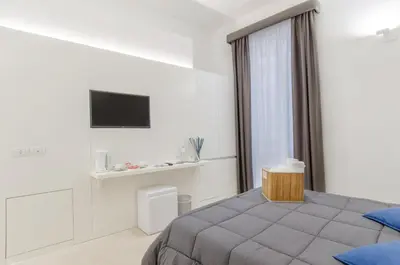 TV o dispositivi per l'intrattenimento presso Ortigia Bed And Breakfast