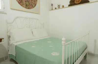 Letto o letti in una camera di Il Giardino di Lucia