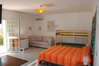 Letto o letti in una camera di Summer Beach Rooms