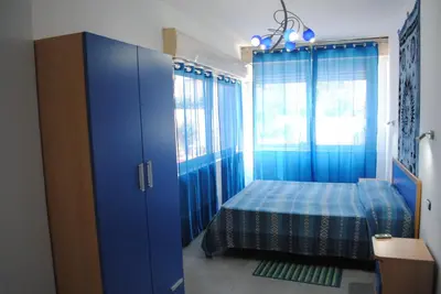 Letto o letti in una camera di Summer Beach Rooms