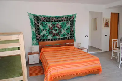 Letto o letti in una camera di Summer Beach Rooms