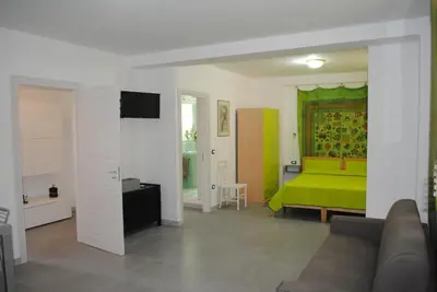 TV o dispositivi per l'intrattenimento presso Summer Beach Rooms